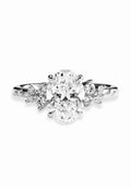 The Aurora Oval Cluster Solitaire ring