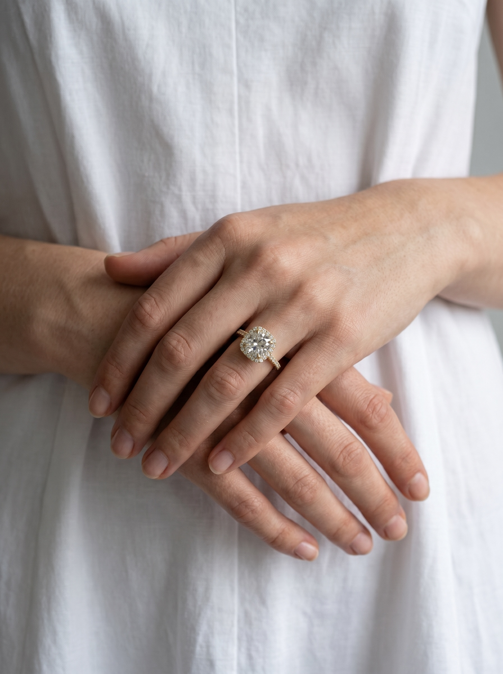 Signature Cushion Halo Solitaire ring