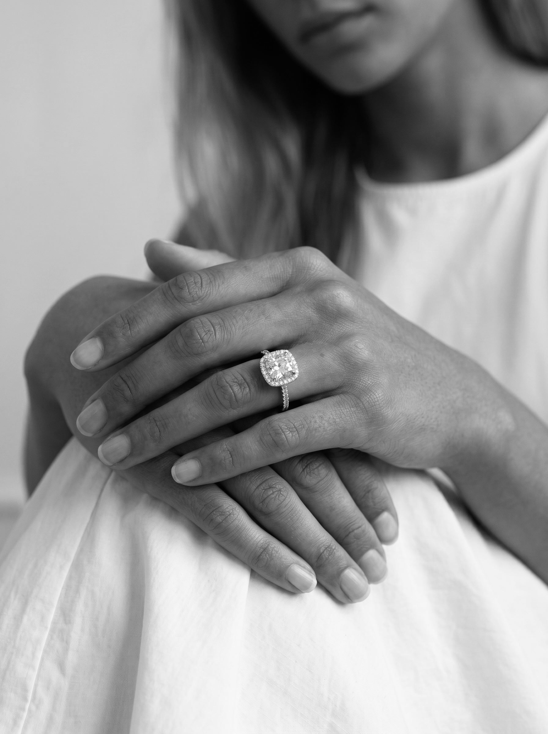 Signature Cushion Halo Solitaire ring