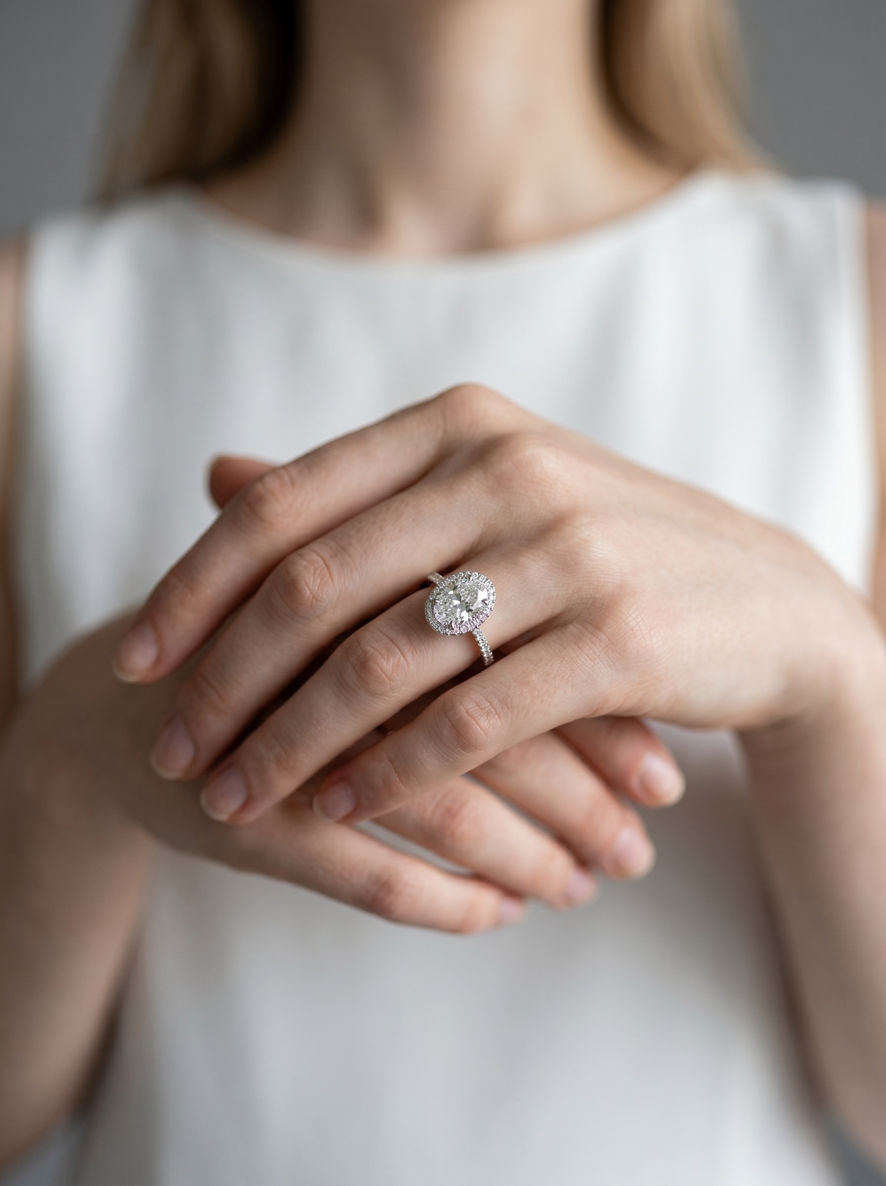 Signature Oval Halo Solitaire ring